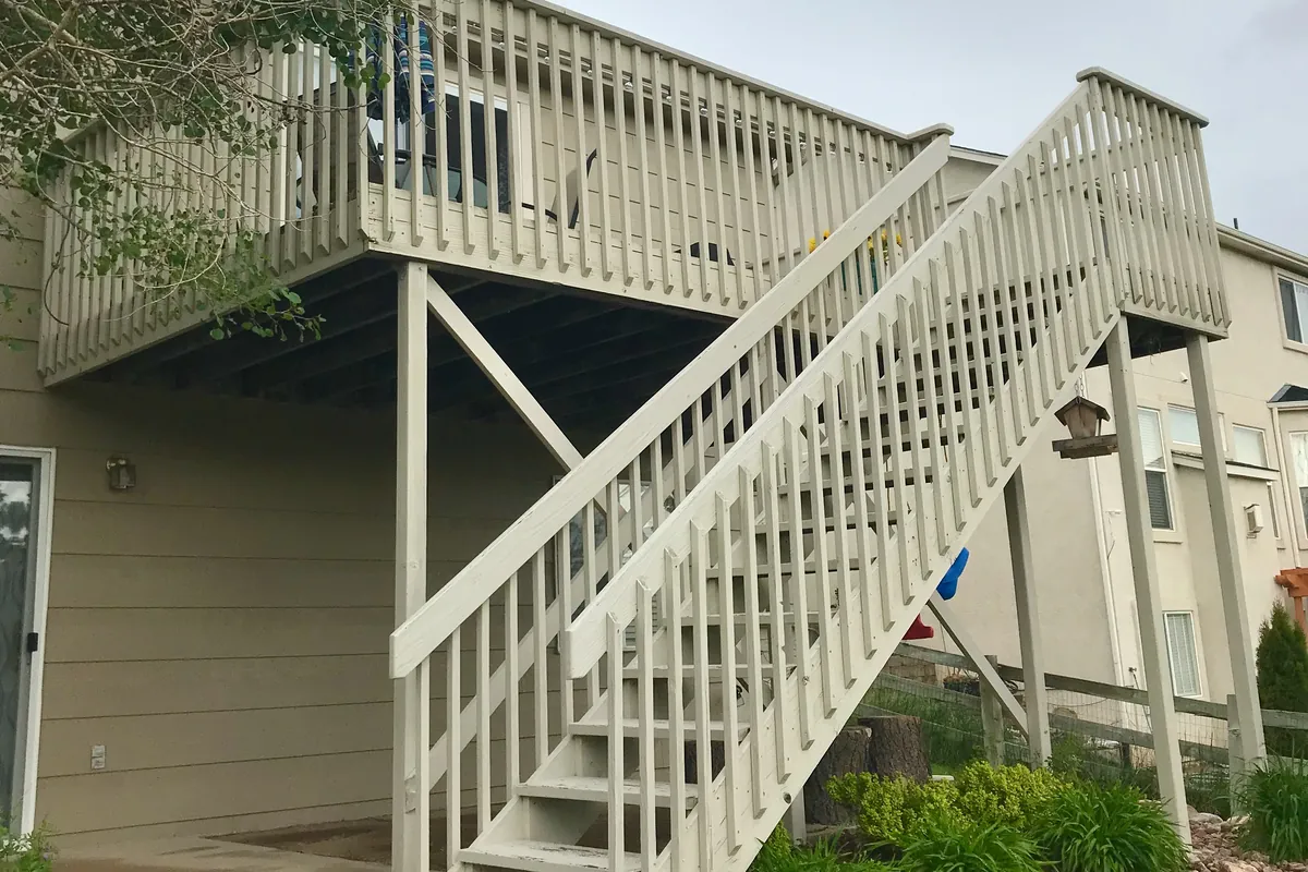An old timber deck and stair before it was rebuilt